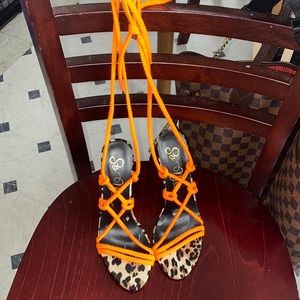 Cheetah print, knee high strap, stiletto heels